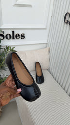 Samuelle Tabi flats