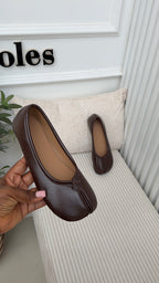 Samuelle Tabi flats